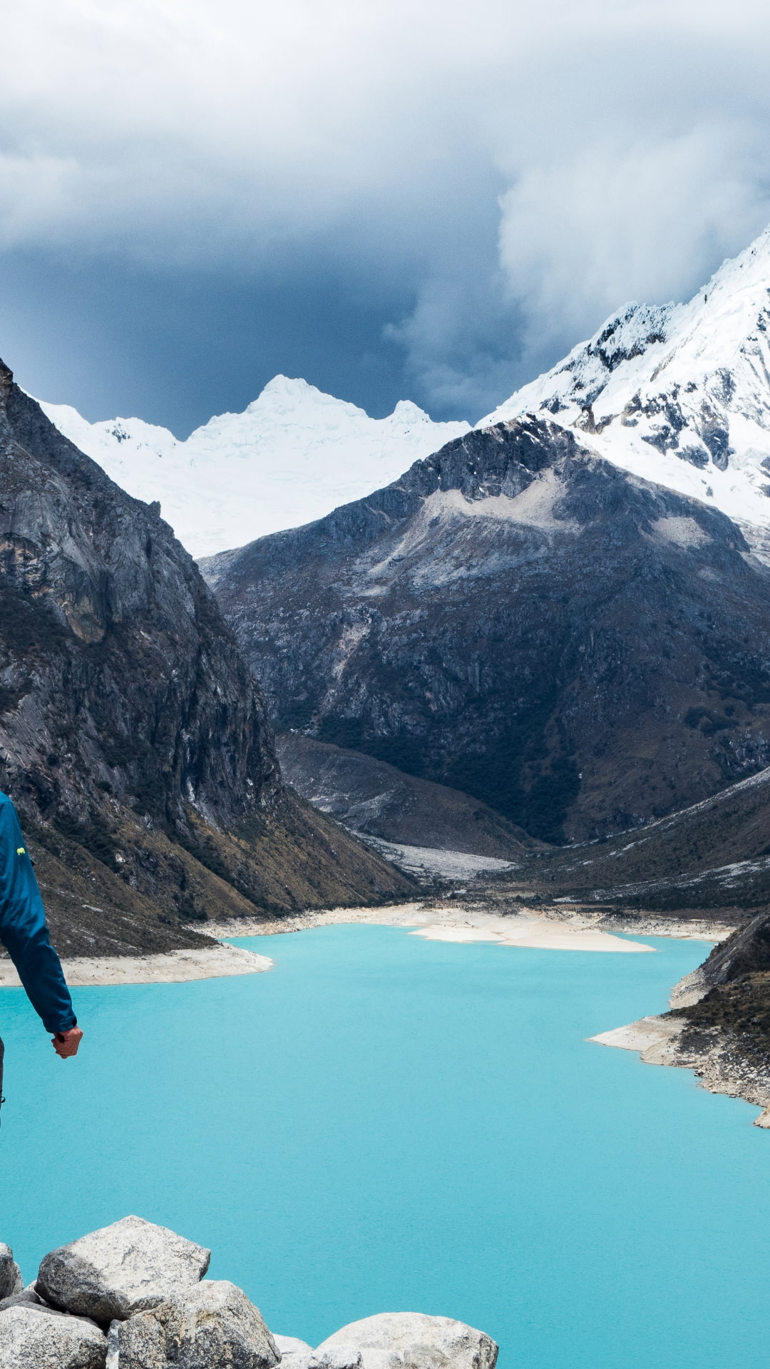Paron Lagoon Lookout Point Stunning turquoise waters of Paron Lagoon surrounded by snow-capped mountains in the Cordillera Blanca.