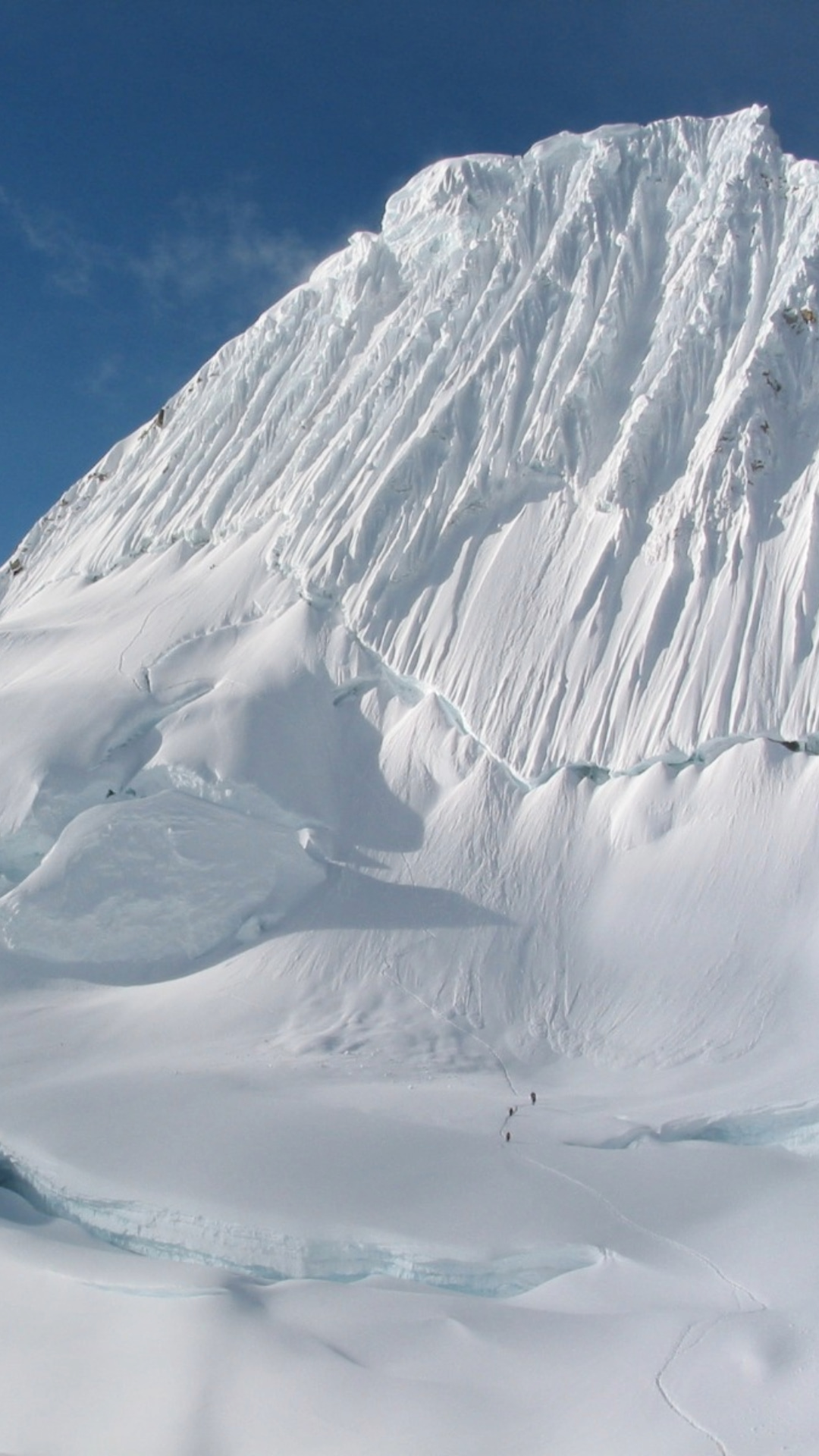 alpamayo-mountain-most-beautiful-peak.jpg View of the pyramidal face of Alpamayo mountain in Cordillera Blanca.